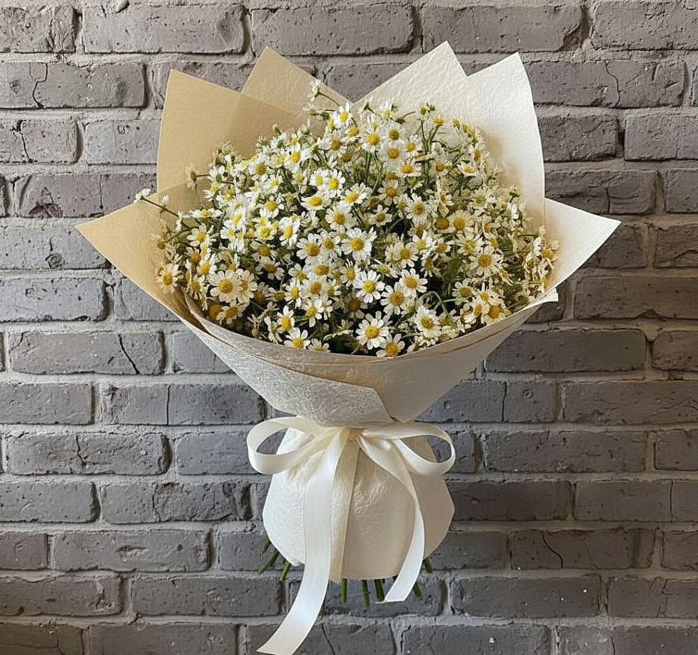 Букет цветов из: Ромашки в Черное